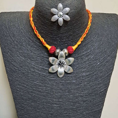 The  Red and yellow flower necklace