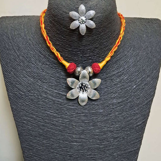 The  Red and yellow flower necklace