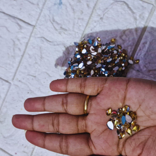Golden Color Stone (90/-for 100gms)